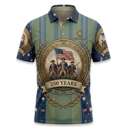 Flat lay view of the custom USA 250 Revolutionary War 1776-2026 golf polo shirt displaying the detailed revolutionary soldier emblem.