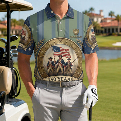 A golfer on the course wearing the custom USA 250 Revolutionary War 1776-2026 golf polo shirt next to a golf cart.