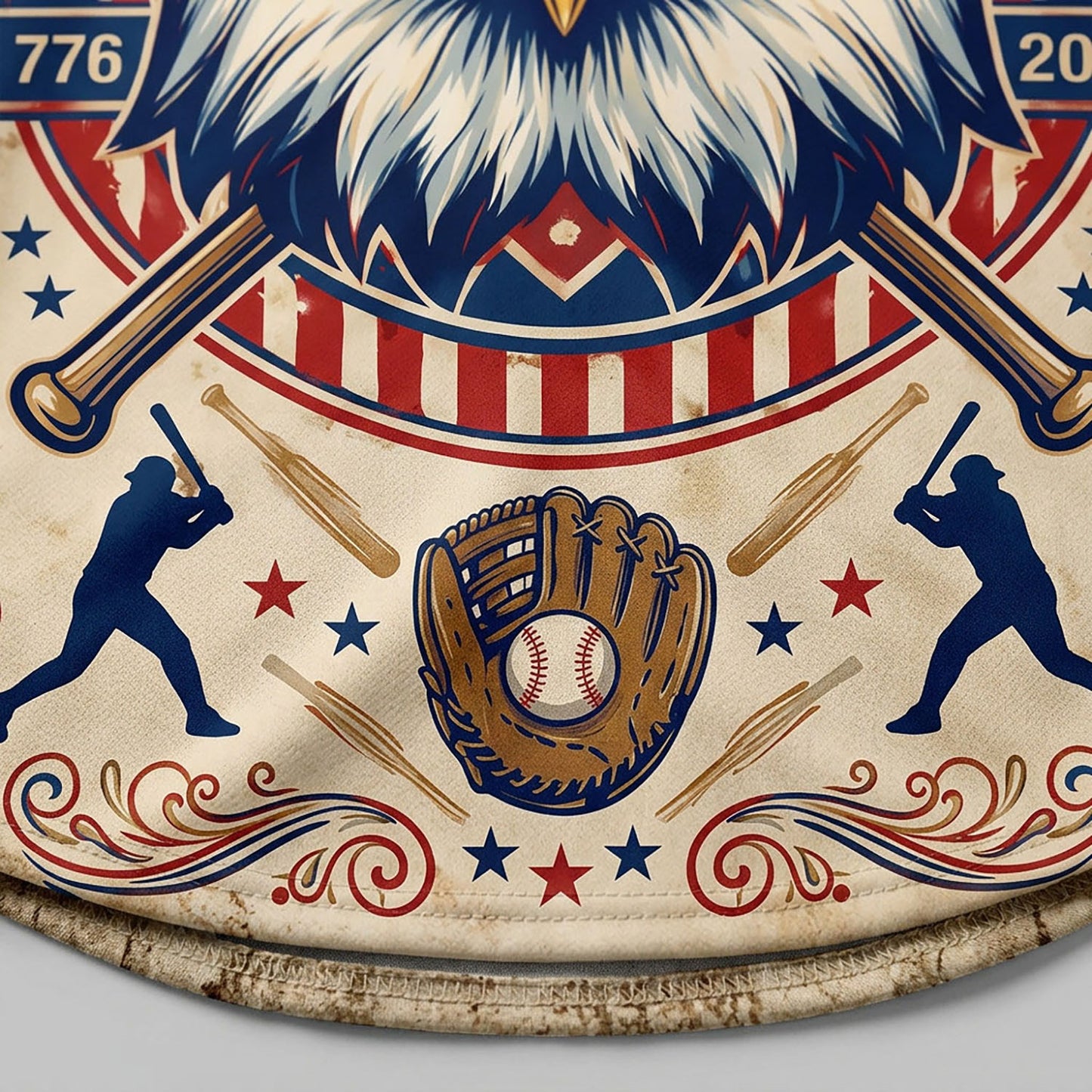 Close-up of the vintage eagle emblem, baseball glove, and 1776-2026 anniversary dates on a patriotic jersey