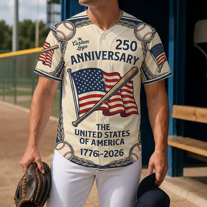 A man wearing a commemorative USA baseball jersey on a sports field