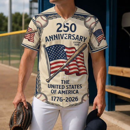 Lifestyle shot of a man wearing a USA 250th anniversary heritage jersey holding a baseball glove on a diamond field