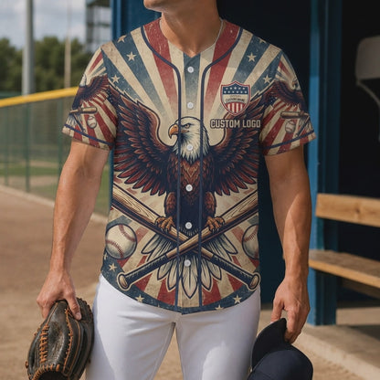 A man wearing a vintage American eagle baseball jersey on a sports field, showcasing the patriotic design