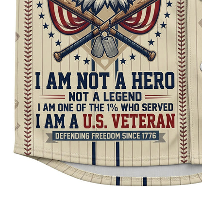 Extreme close-up of the lower front print on the cream jersey showcasing the bold text I Am Not A Hero I Am A US Veteran and vertical pinstripes.