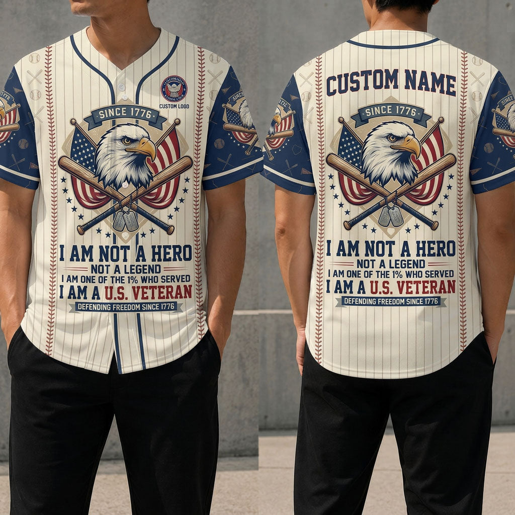 Front and back view of a cream pinstripe US veteran baseball jersey featuring an eagle head, crossed bats, American flags, and military dog tags.