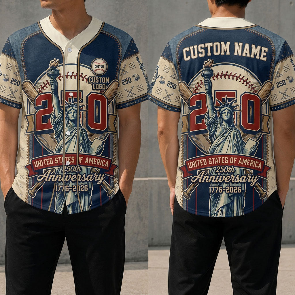 Front and back view of a cream and navy textured USA 250th anniversary baseball jersey featuring the Statue of Liberty and bold 250 graphics.