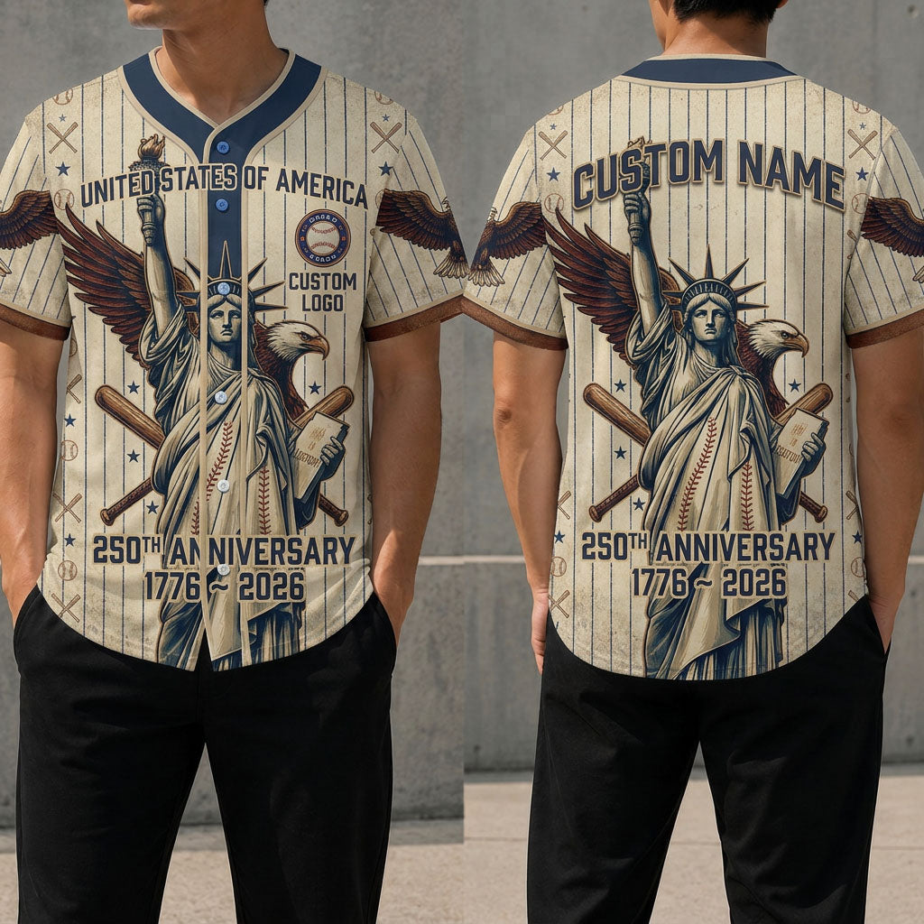 Front and back view of a cream pinstripe USA 250th anniversary baseball jersey featuring the Statue of Liberty, bald eagle, and 1776-2026 graphics.