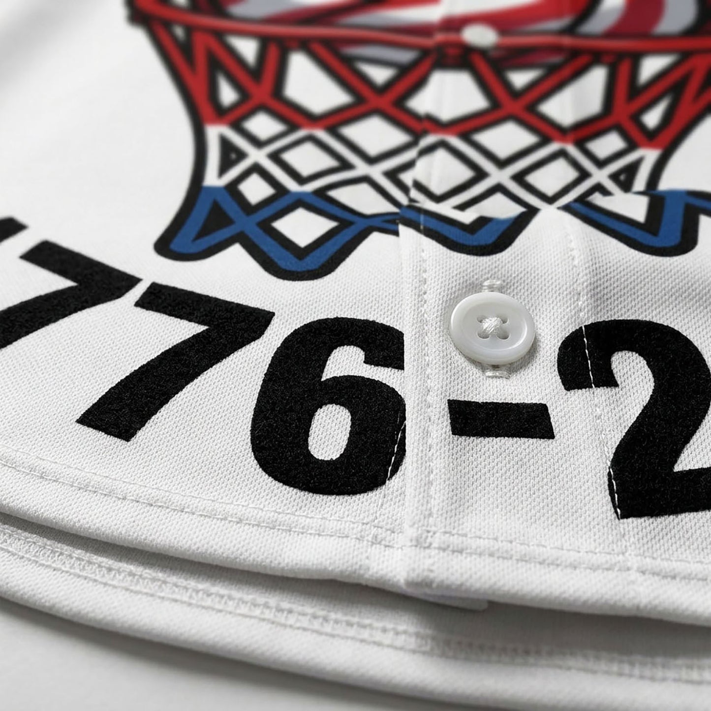 Close-Up Detail Of High-Quality Stitching And Buttons On The 250th Anniversary Basketball Jersey