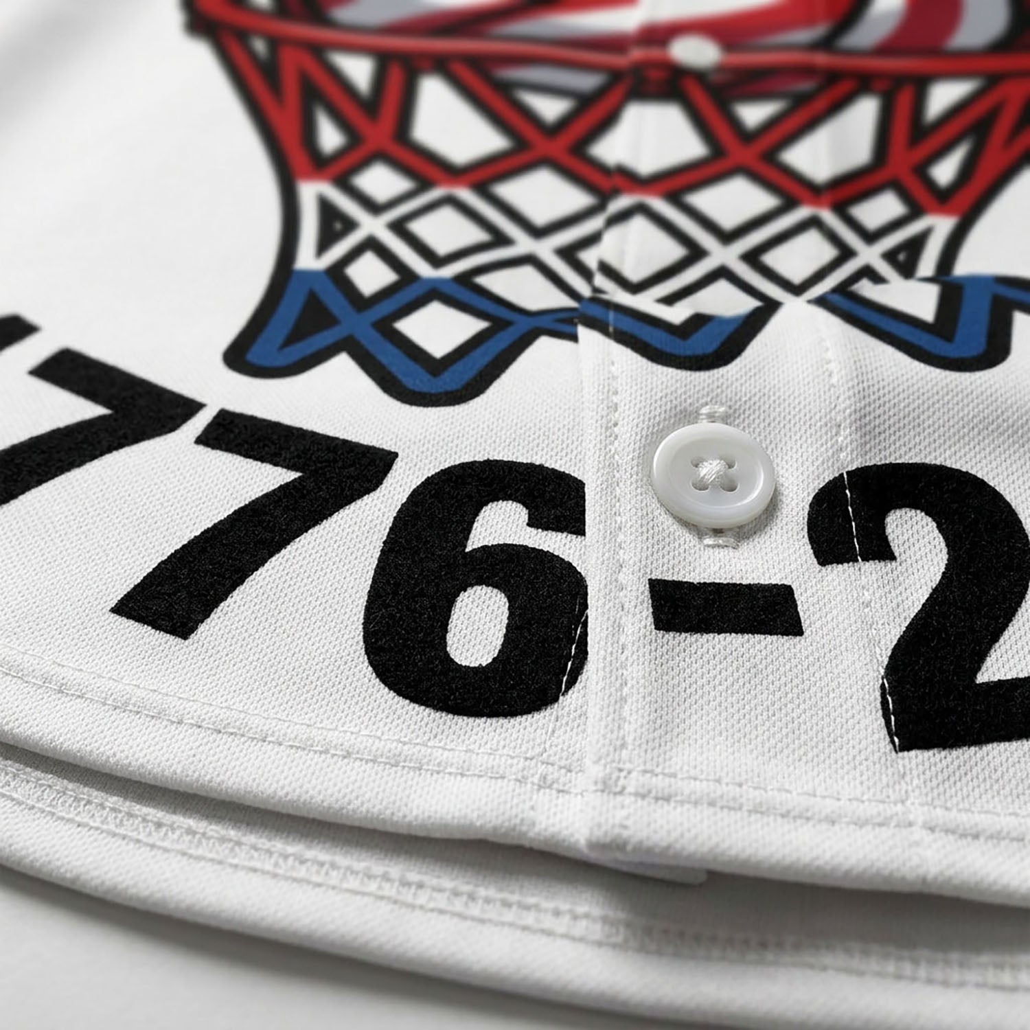 Close-Up Detail Of High-Quality Stitching And Buttons On The 250th Anniversary Basketball Jersey