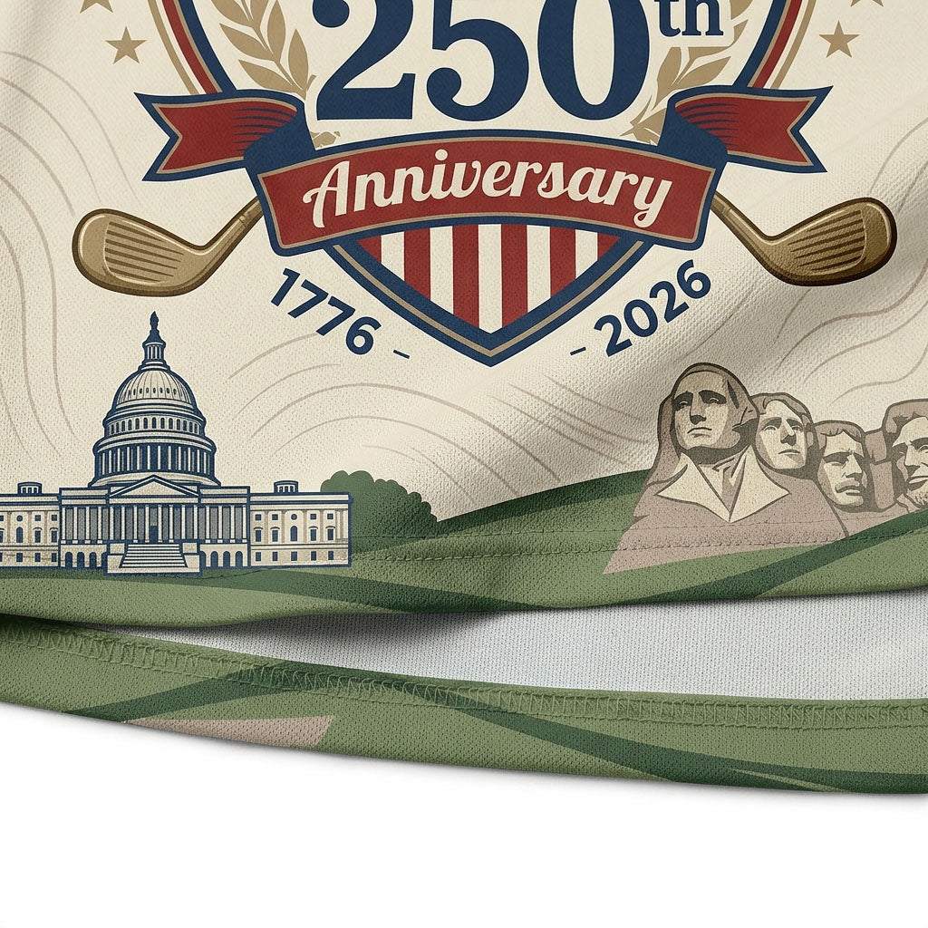 Close up detail of the golf polo showing the Statue of Liberty graphic, crossed clubs, and patriotic bunting banner pattern.