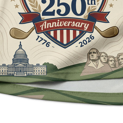 Close up detail of the golf polo showing the Statue of Liberty graphic, crossed clubs, and patriotic bunting banner pattern.