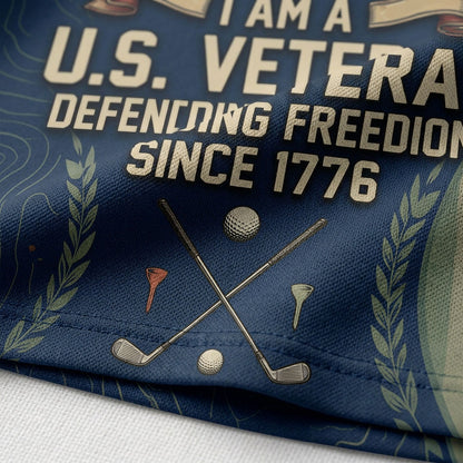 Close up detail of the custom golf polo showing the detailed bald eagle wearing dog tags, American flags, and historic veteran quote.