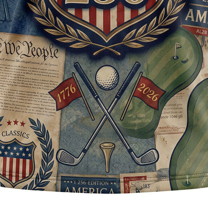 Close up detail of the polo highlighting the vintage America 250 shield, crossed golf clubs, and historical patchwork textures.