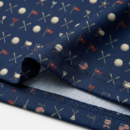 Close-up of Statue of Liberty emblem and pattern on patriotic golf polo
