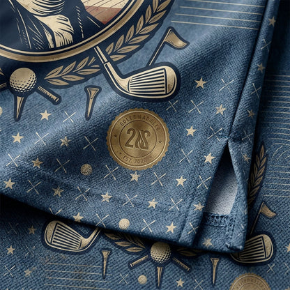 Close-up of George Washington portrait and 1776-2026 emblem on golf polo