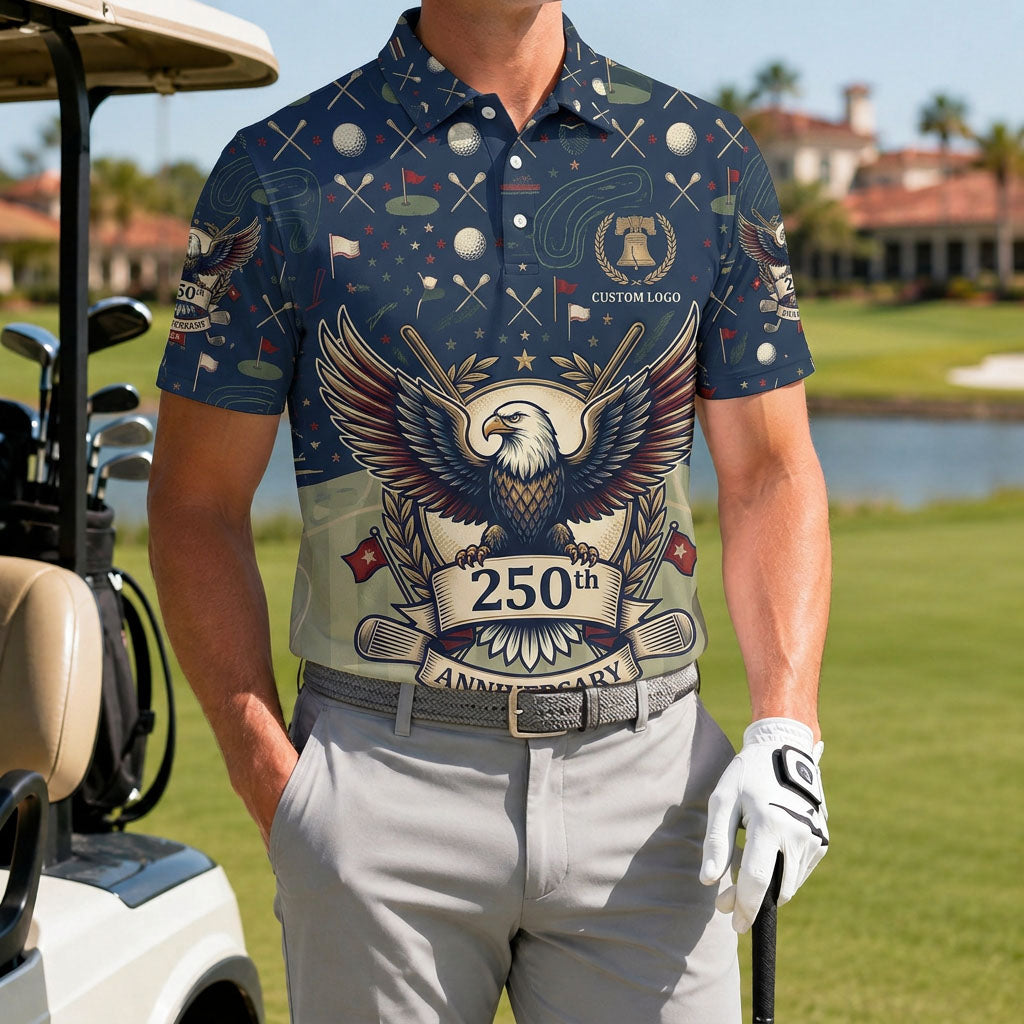 A male golfer wearing the custom USA Eagle 250th Anniversary polo shirt standing on a premium country club fairway green.