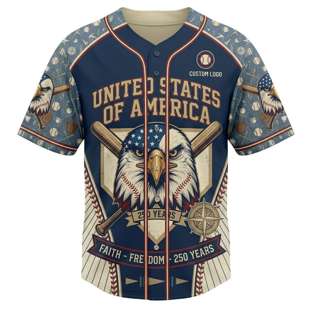 Front view of a navy blue USA Faith Freedom 250 Years baseball jersey with a majestic bald eagle graphic, crossed bats, and stars on the shoulders.