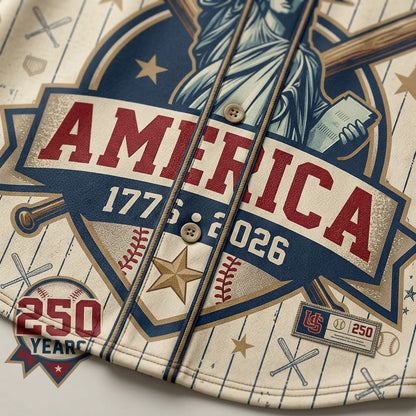 Close-up shot of the detailed retro print reading America 1776-2026 and premium tan buttons on a patriotic baseball jersey.
