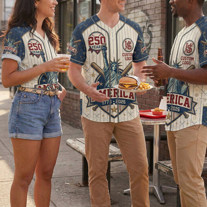 A group of multi-ethnic friends wearing matching USA Liberty baseball jerseys while hanging out and eating outdoors.