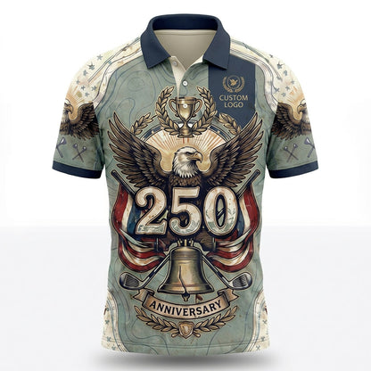 Front view of a sage green USA Liberty Bell 250 Years anniversary golf polo shirt with a heavy shield crest and custom badge lines.