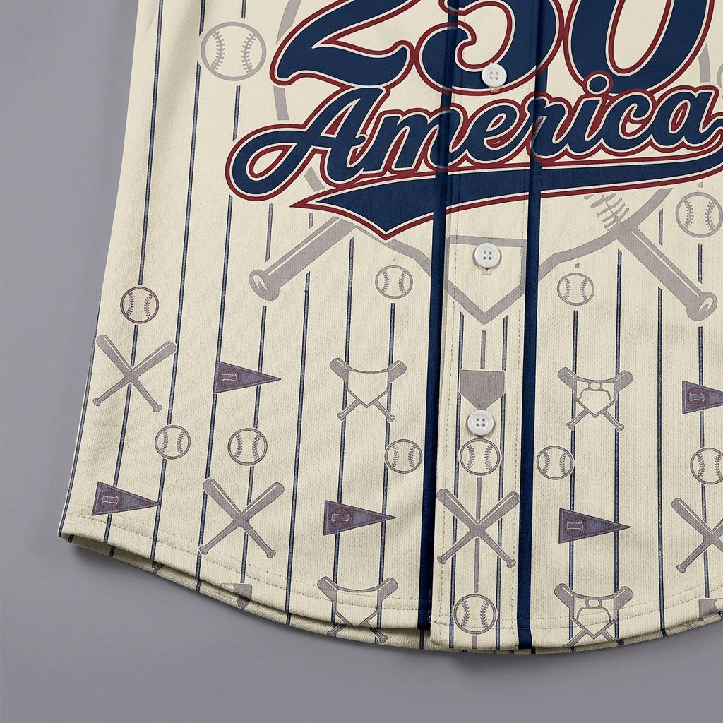 Close-up shot of the lower button area on the cream baseball shirt displaying detailed print of crossed bats, baseballs, and stadium pennant patterns.